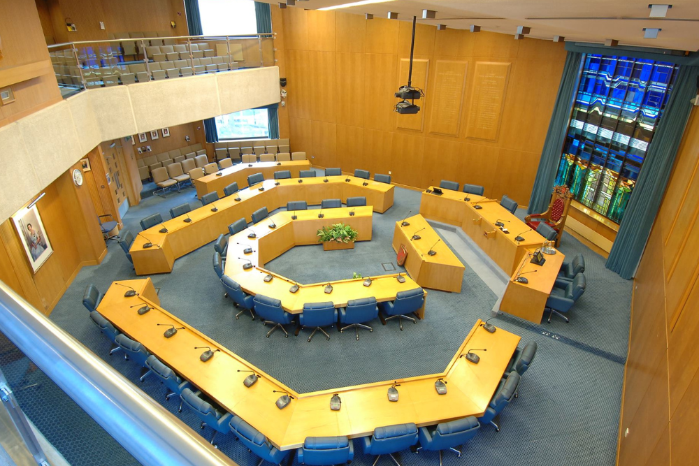 An image of Woking Borough Council's Council Chamber taken from a balcony