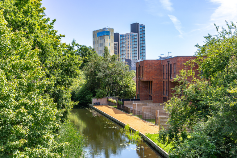 A view of Woking town centre from the Basingstoke Canal. Also pictured are new riverside homes.