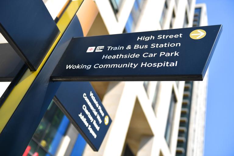 Signpost in Victoria Square, Woking