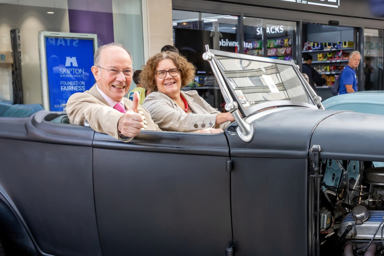 The Mayor and Council Leader sitting in a classic car