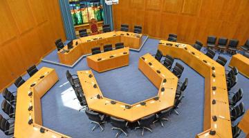 Woking Borough Council chamber where councillors attend and take part in Full Council meetings.