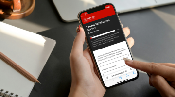 Female completing the tenant satisfaction survey on a smartphone