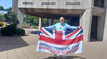 Mayor of Woking, Cllr Rob Leach, with Armed Forces Day flag