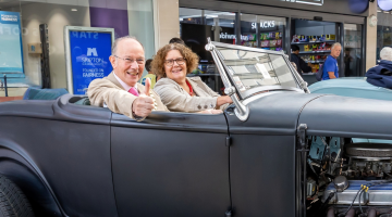 The Mayor and Council Leader sitting in a classic car